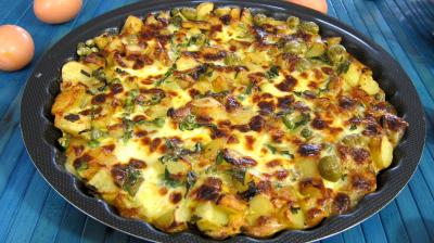 Oeufs : Assiette de frittata aux pommes de terre et petits pois