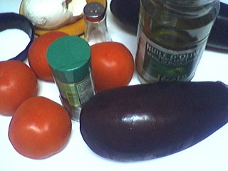 Ingrédients pour la recette : Gratin d'aubergines et tomates à la mozzarelle