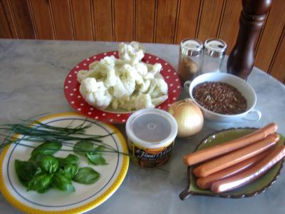 Ingrédients pour la recette : Chou-fleur et riz aux saucisses