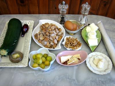 Ingrédients pour la recette : Courgettes aux champignons en quiche