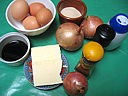 Ingrédients pour la recette : Oeufs au plat et aux oignons confits