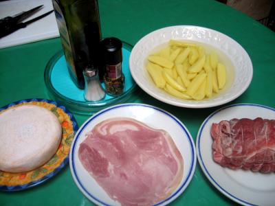 Ingrédients pour la recette : Rôti de porc farci au jambon et reblochon